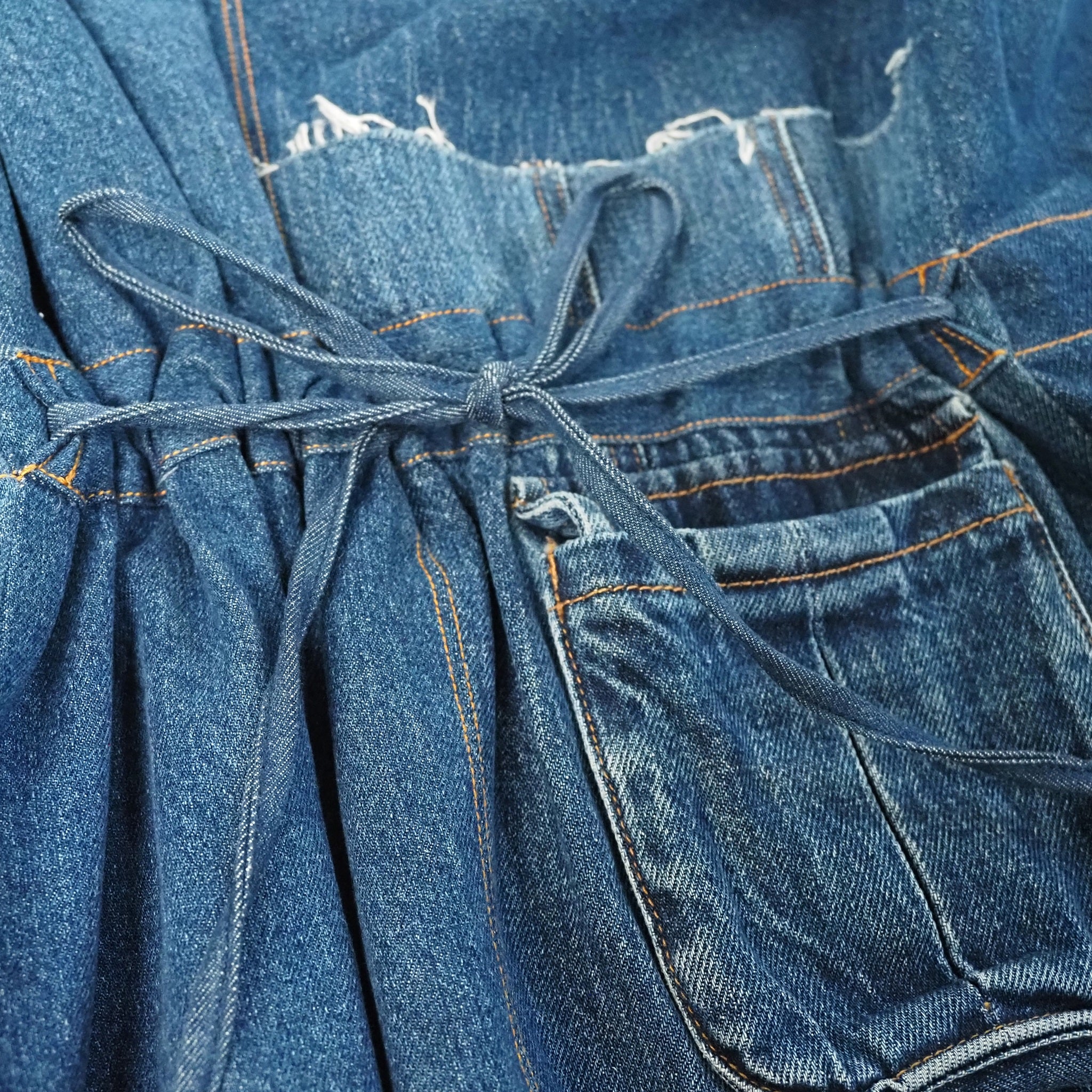 designer custom handcrafted waist-tie denim vest